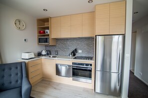 2 Bedroom Apartment (2BR) | Private kitchen | Fridge, coffee/tea maker - Tasman Holiday Parks - Te Anau (Te Anau)