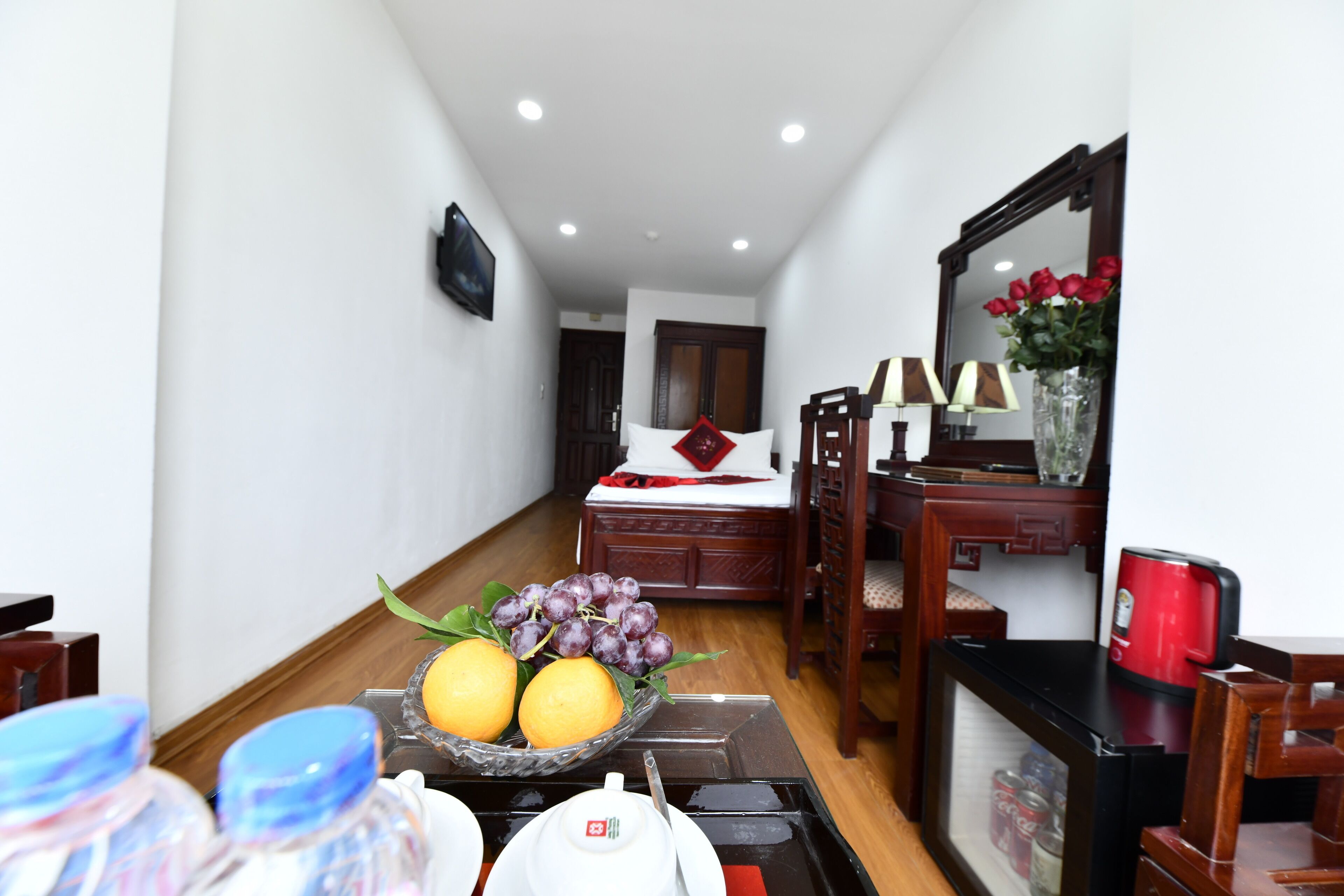 deluxe double room, balcony, city view | minibar, in-room safe, desk, laptop workspace