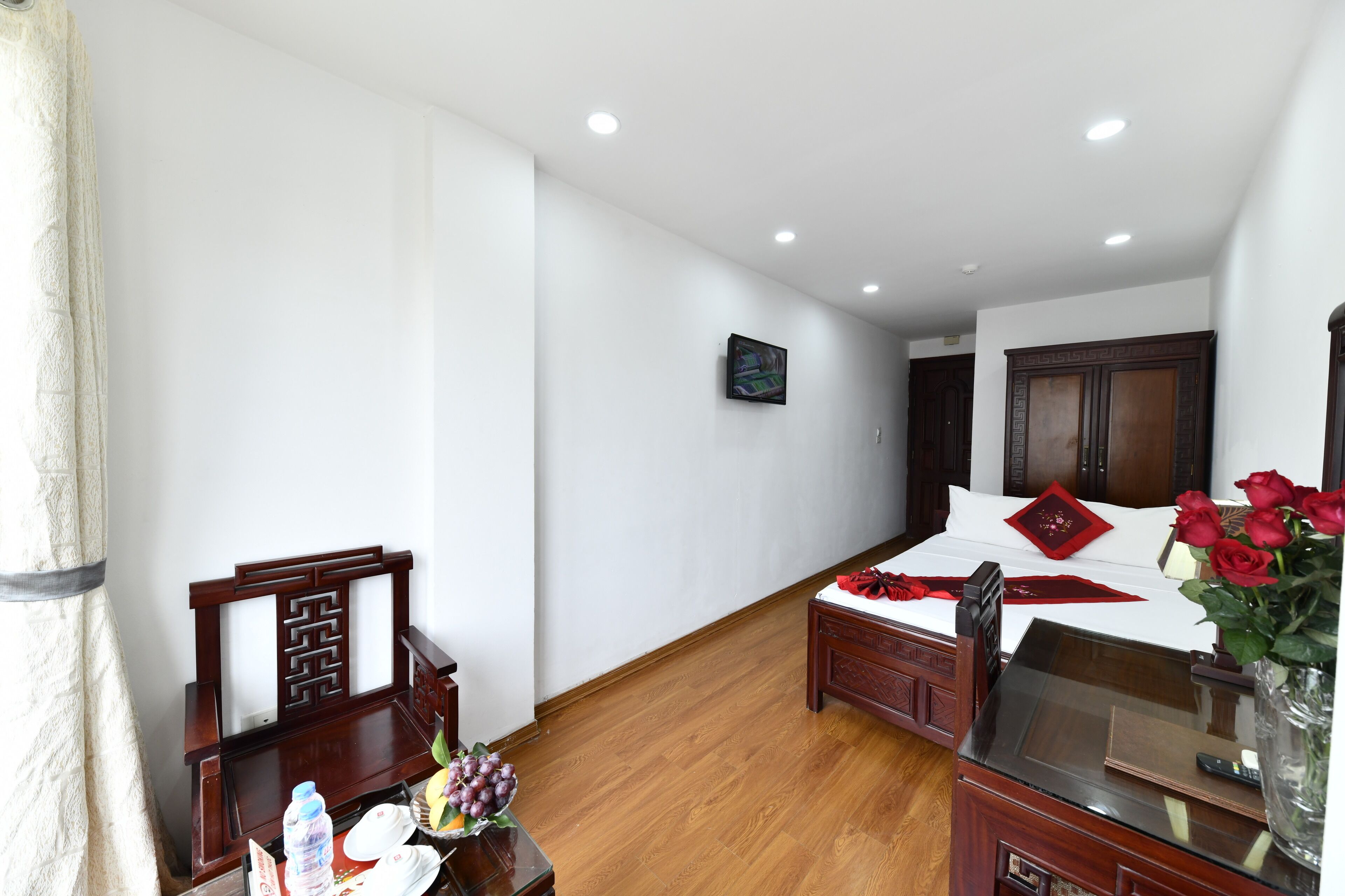 deluxe double room, balcony, city view | minibar, in-room safe, desk, laptop workspace