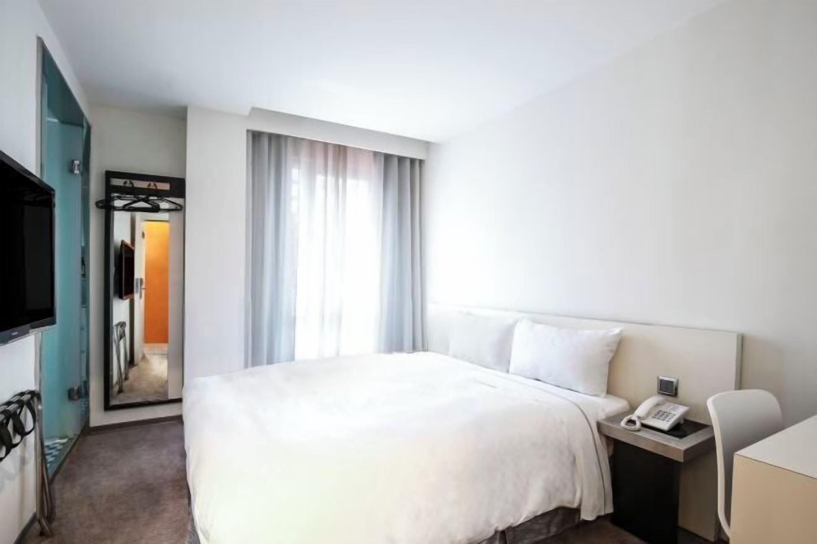 1 slaapkamer, luxe beddengoed, donsdekens, een minibar