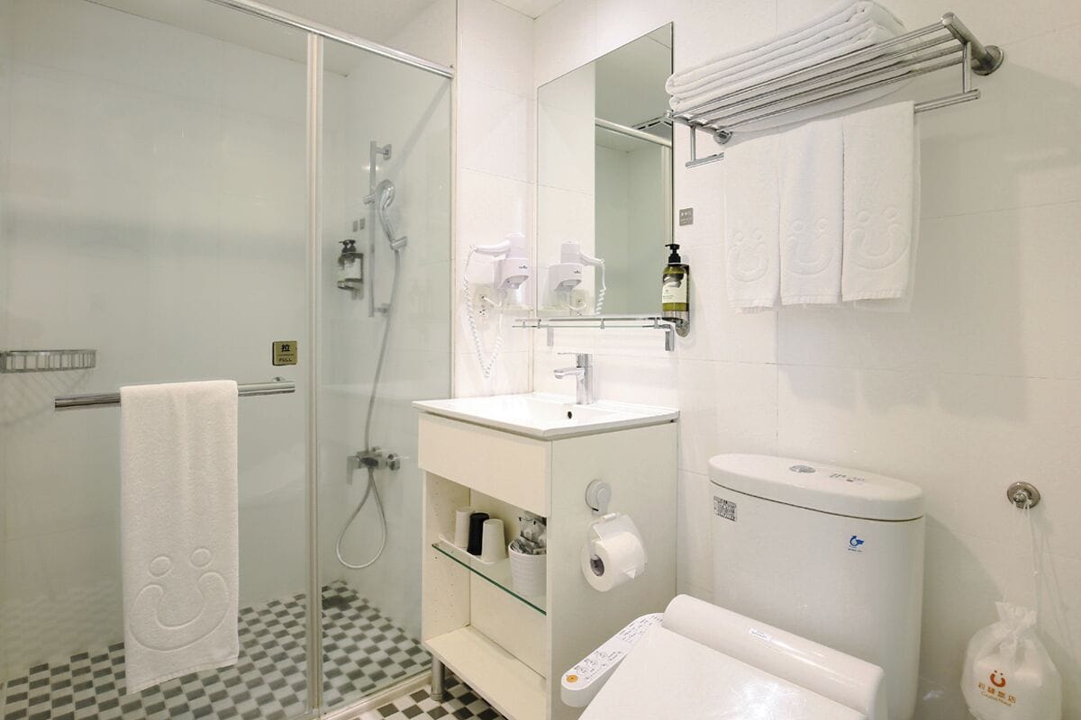 standard triple room (washlet toilet) | bathroom | shower, hair dryer, electronic bidet, towels