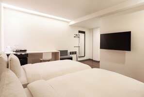 Deluxe Twin kamer, 2 eenpersoonsbedden (washlet toilet) | 1 slaapkamer, luxe beddengoed, donsdekens, een minibar
