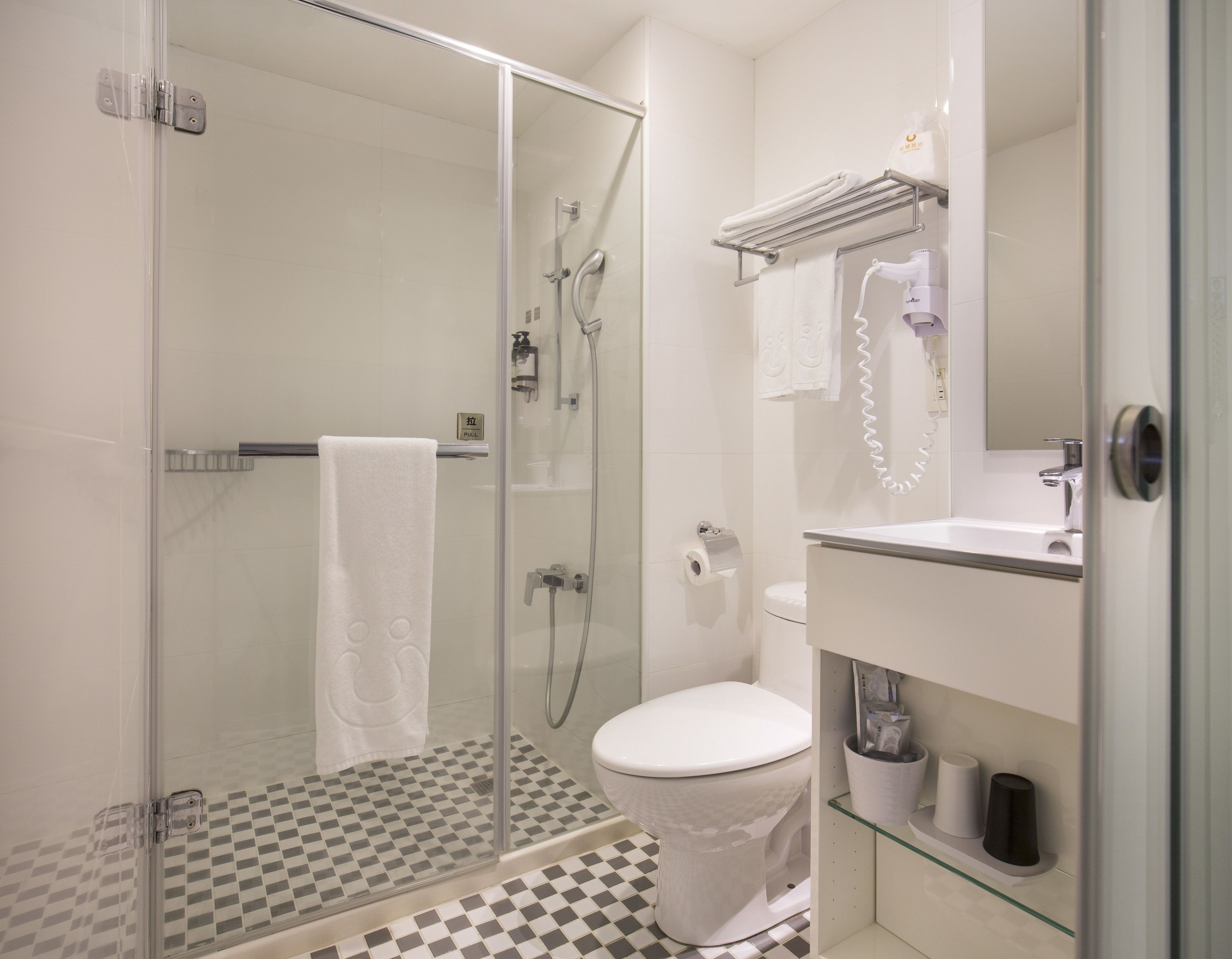 shower, hair dryer, electronic bidet, towels