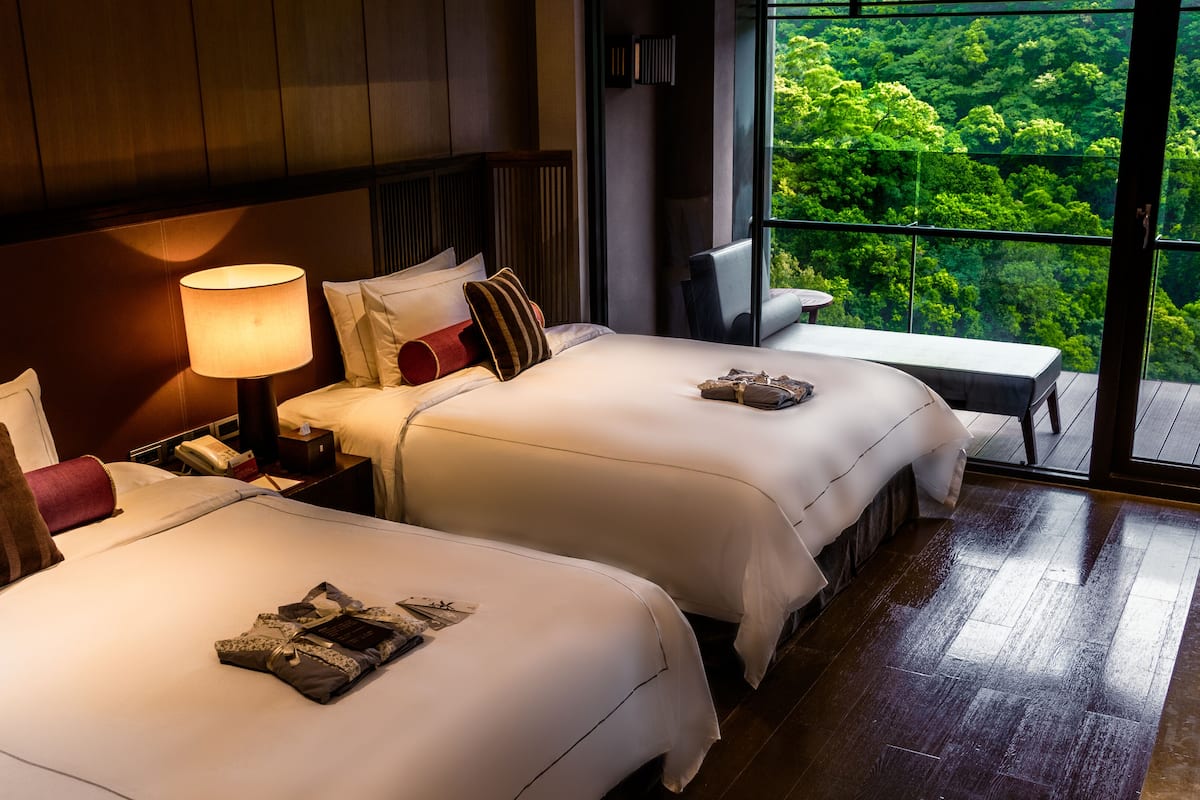 deluxe family room | 1 bedroom, minibar, in-room safe, blackout curtains