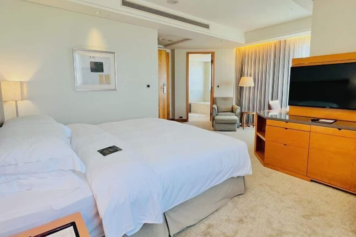 Premium bedding, down comforters, pillowtop beds, in-room safe