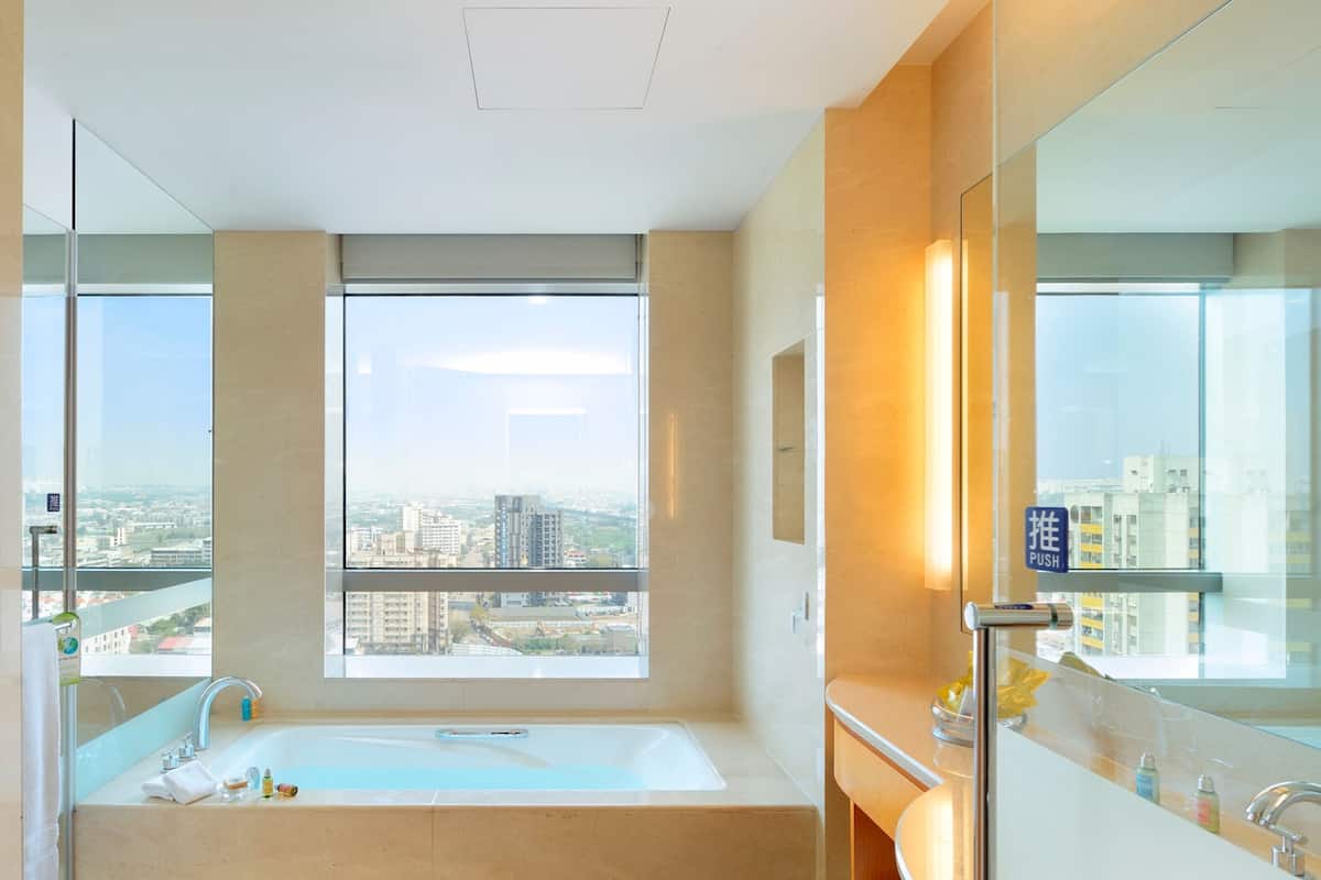 business room, 1 king bed | bathroom | separate bathtub and shower, deep-soaking bathtub, rainfall showerhead