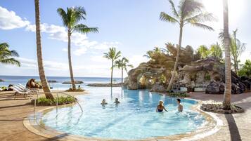 3 outdoor pools, cabanas (surcharge), pool umbrellas