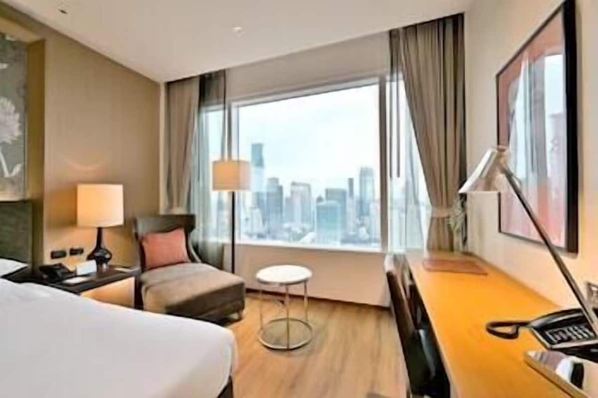 Luxe beddengoed, een kluis op de kamer, een bureau
