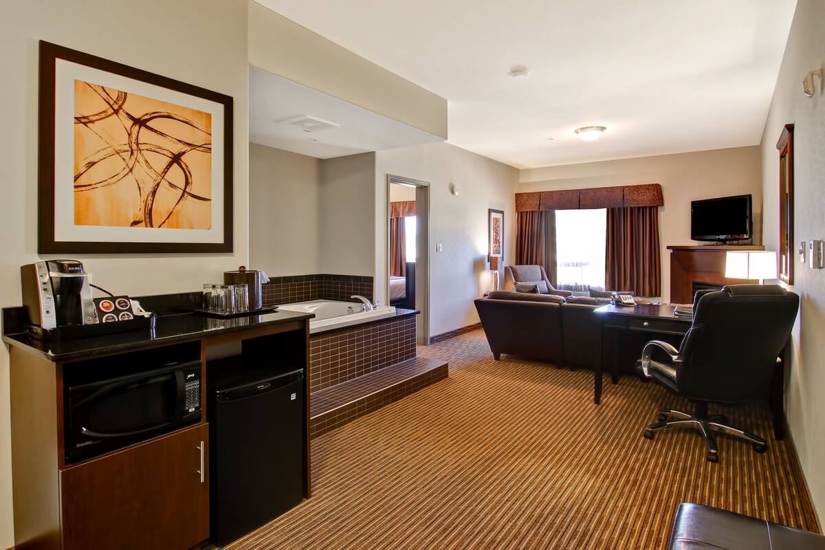 desk, laptop workspace, blackout curtains, iron/ironing board