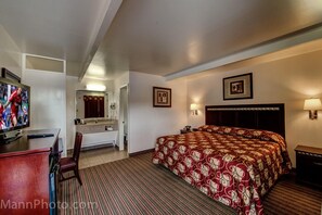 Premium bedding, desk, laptop workspace, blackout curtains