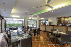 Breakfast, lunch, dinner served; international cuisine, pool views