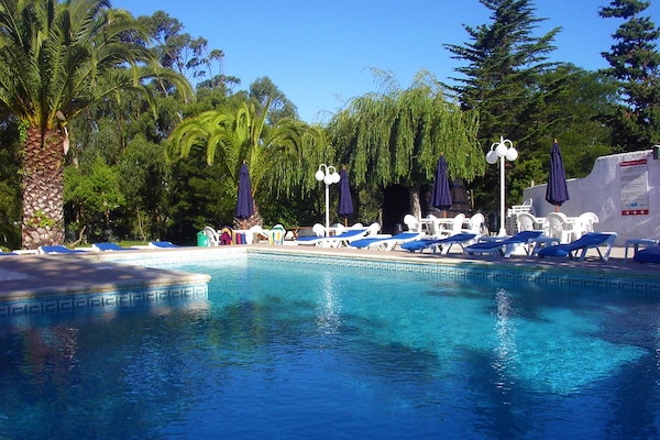 2 outdoor pools, pool umbrellas, sun loungers