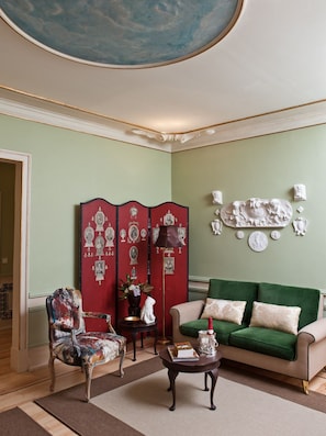 Standard Suite, Kitchenette | Living room | Plasma TV, iPod dock