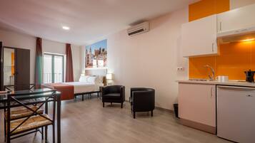 Fridge, microwave, cookware/dishes/utensils