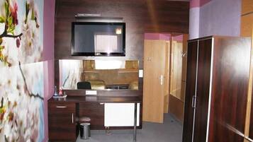 42-inch flat-screen TV with cable channels, TV