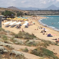On the beach, sun loungers, beach umbrellas, beach volleyball