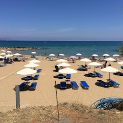 On the beach, sun loungers, beach umbrellas, beach volleyball