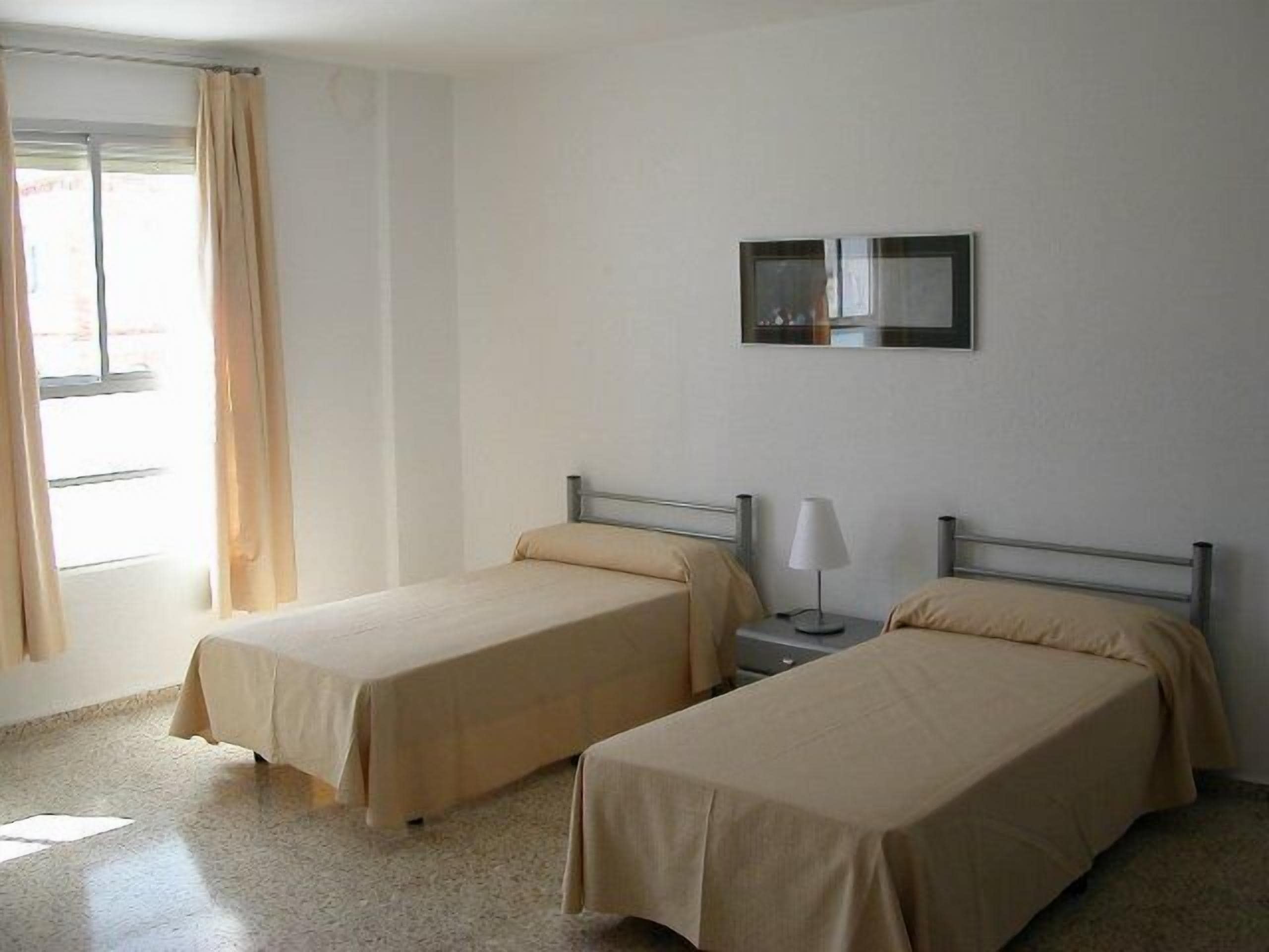 Basic Double Room, Private Bathroom | Blackout curtains, bed sheets
