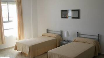 Basic Double Room, Private Bathroom | Blackout curtains, bed sheets