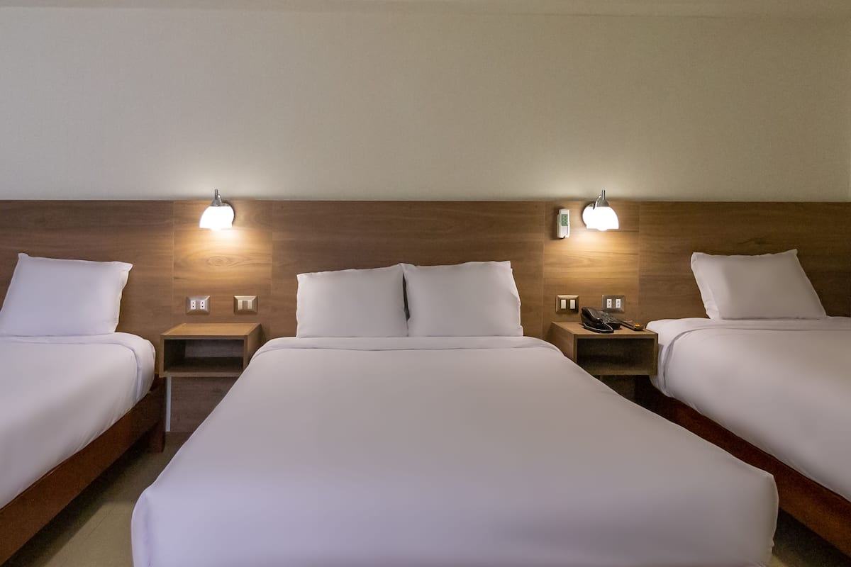 family triple room | in-room safe, desk, laptop workspace, iron/ironing board