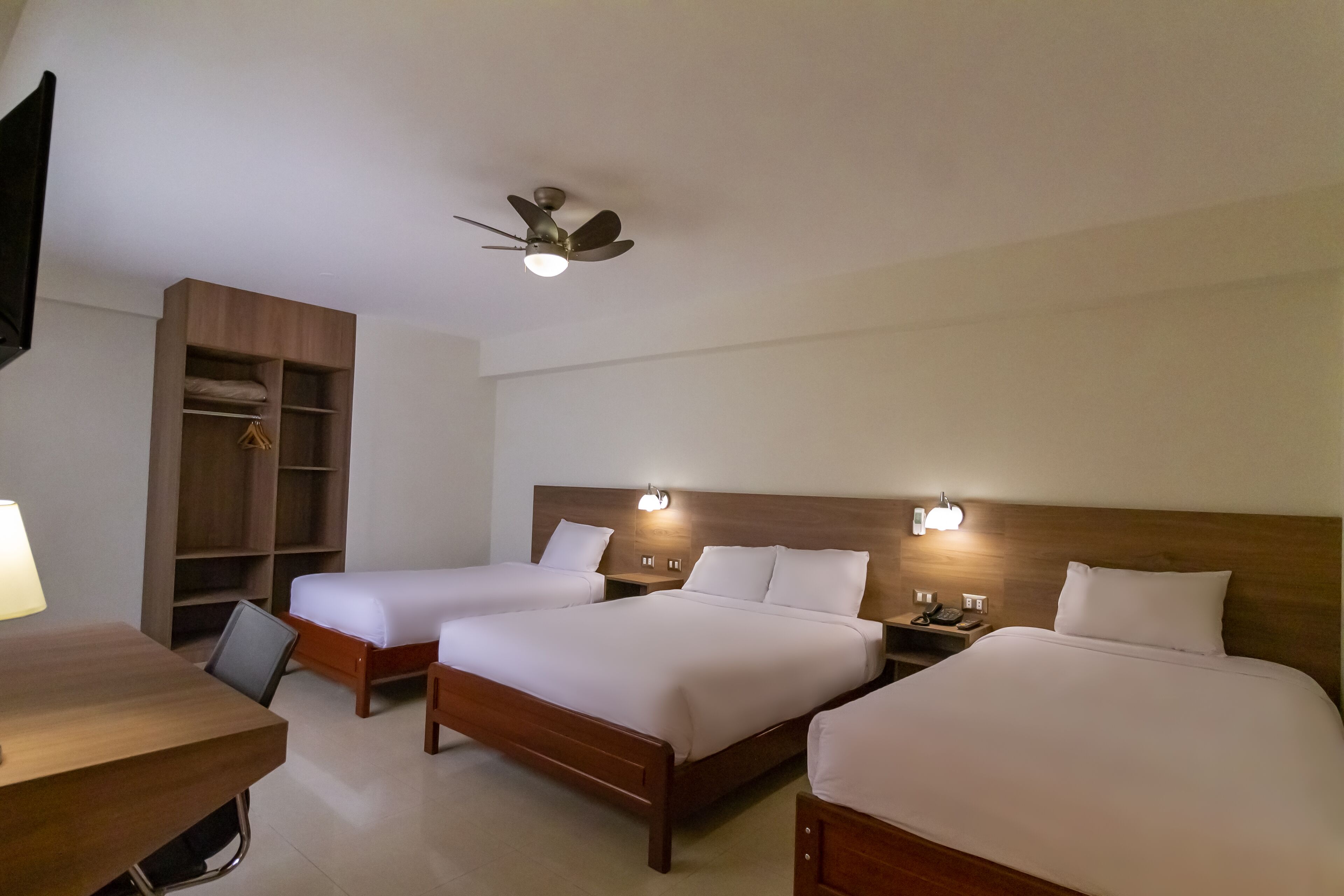 family triple room | in-room safe, desk, laptop workspace, iron/ironing board