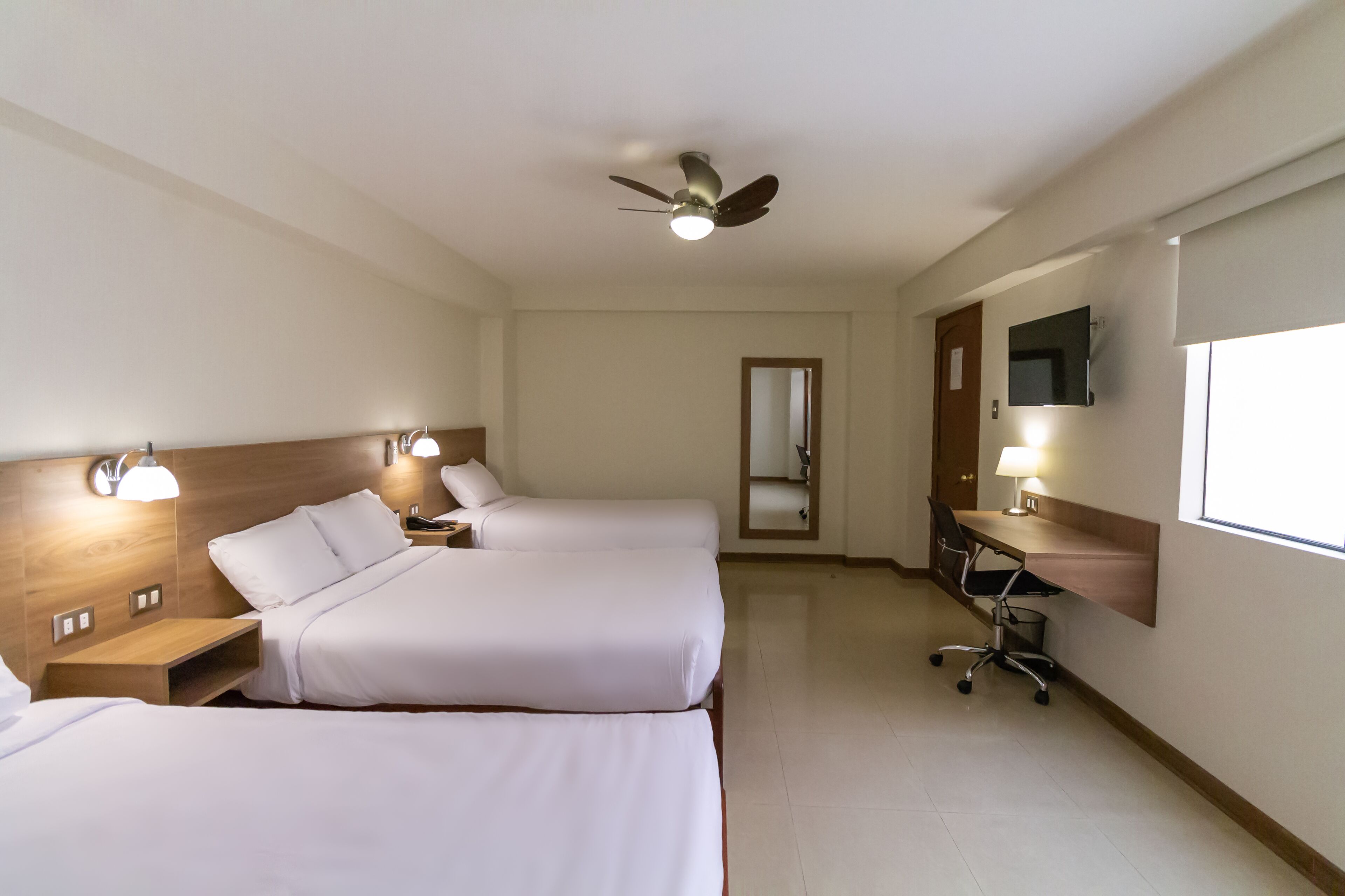 family triple room | in-room safe, desk, laptop workspace, iron/ironing board