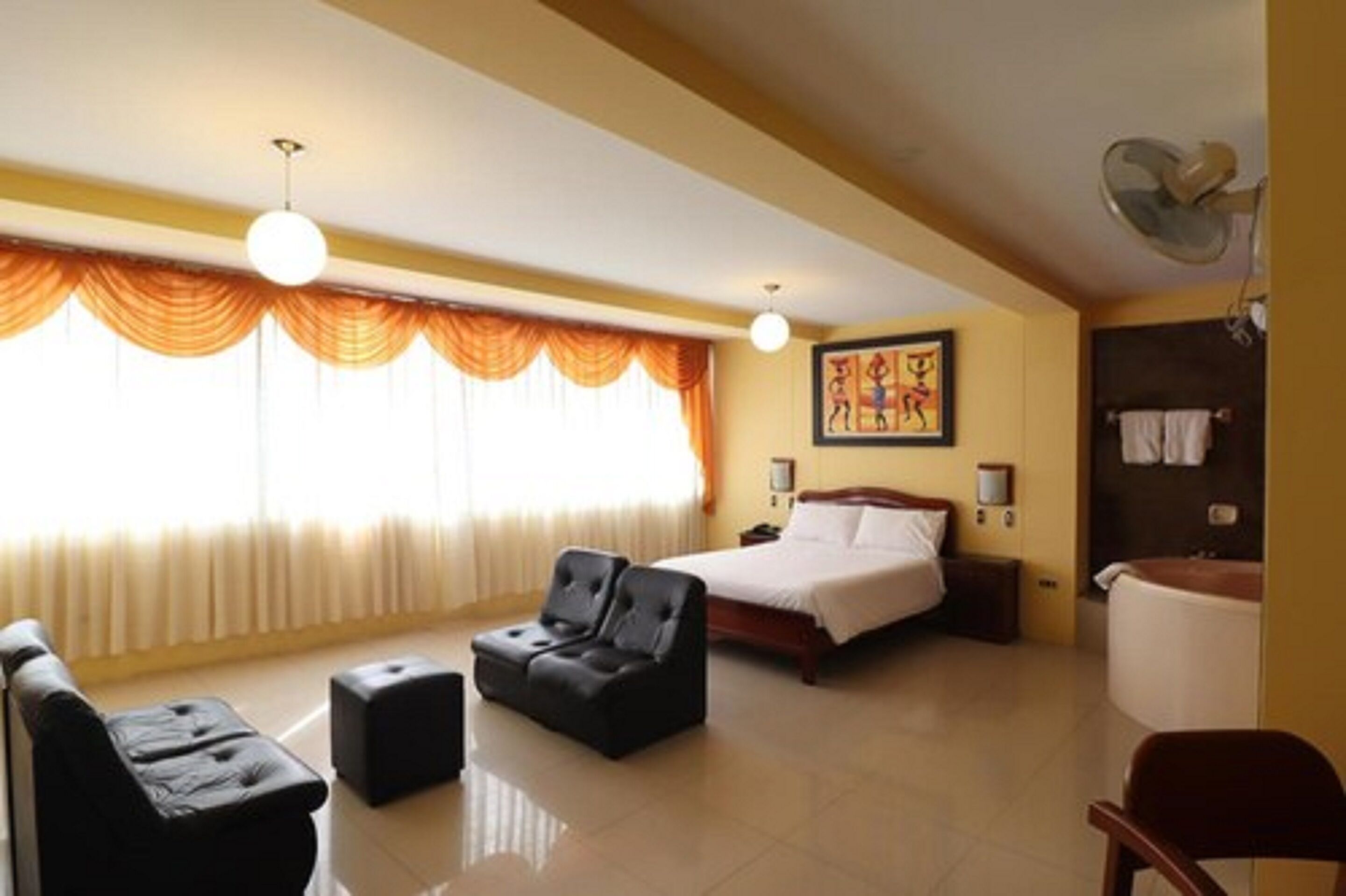 suite | in-room safe, desk, laptop workspace, iron/ironing board