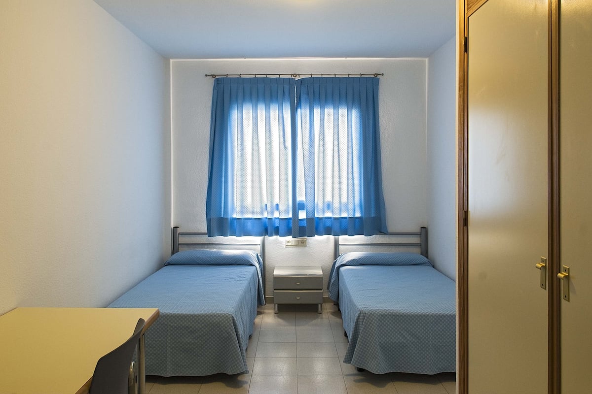 desk, blackout curtains, free wifi, bed sheets