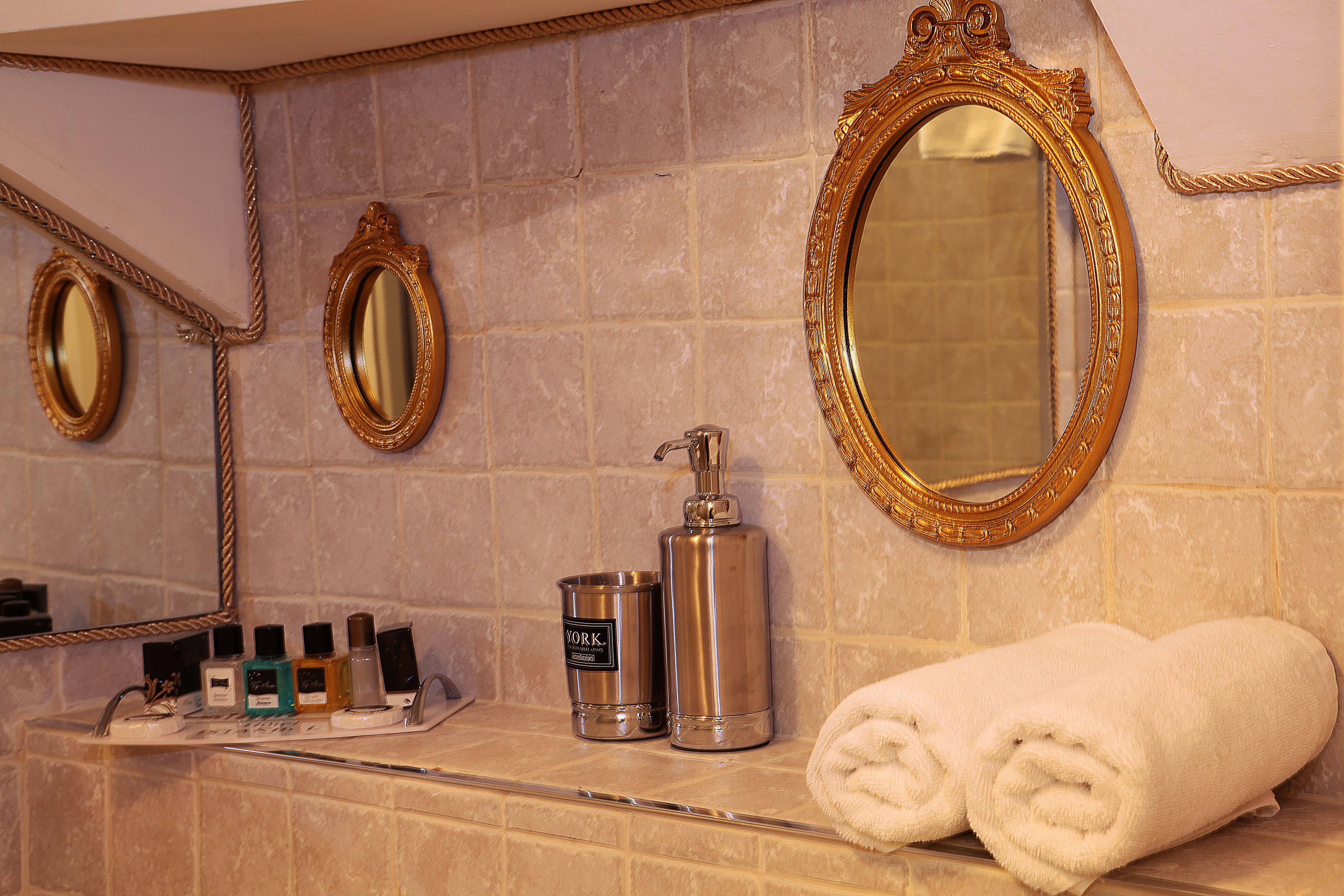 family quadruple room, 2 queen beds | bathroom amenities | shower, designer toiletries, hair dryer, slippers