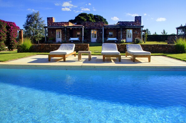 Outdoor pool, pool umbrellas, pool loungers