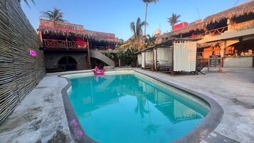 Outdoor pool, pool umbrellas, sun loungers