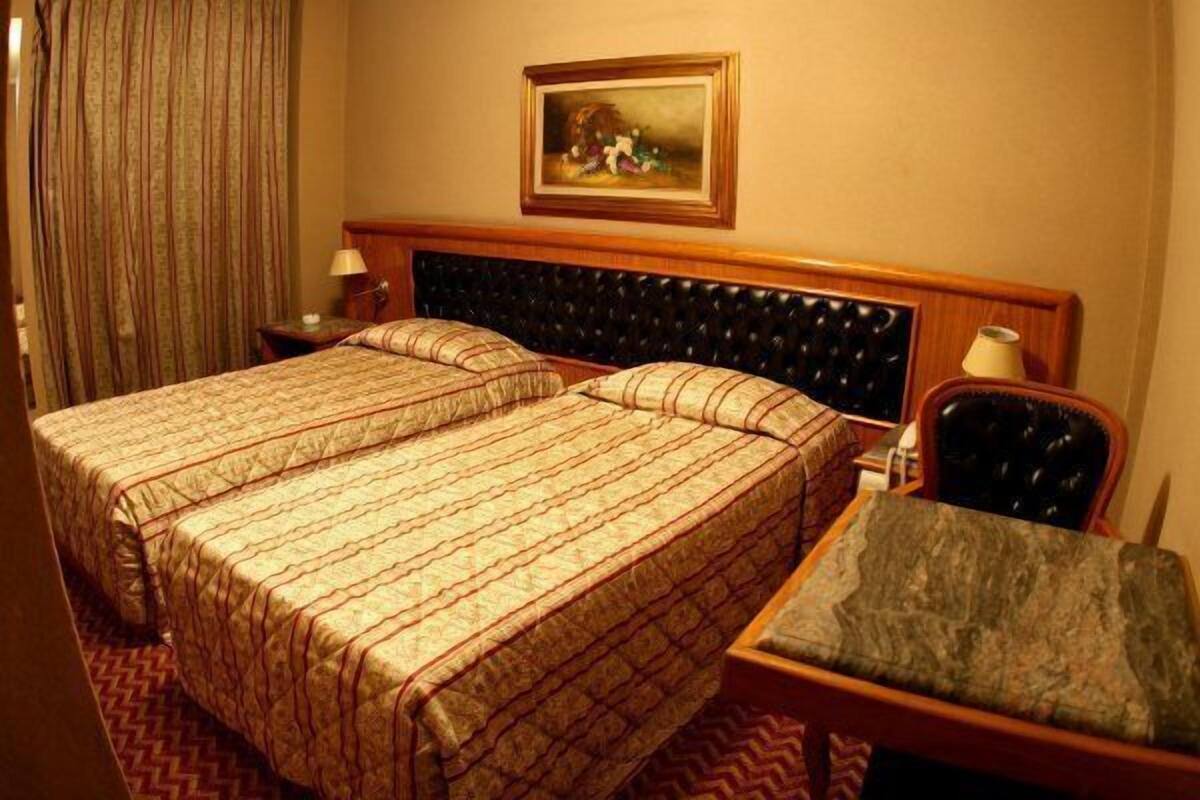 Chambre Triple, 1 lit double et 1 canapé-lit