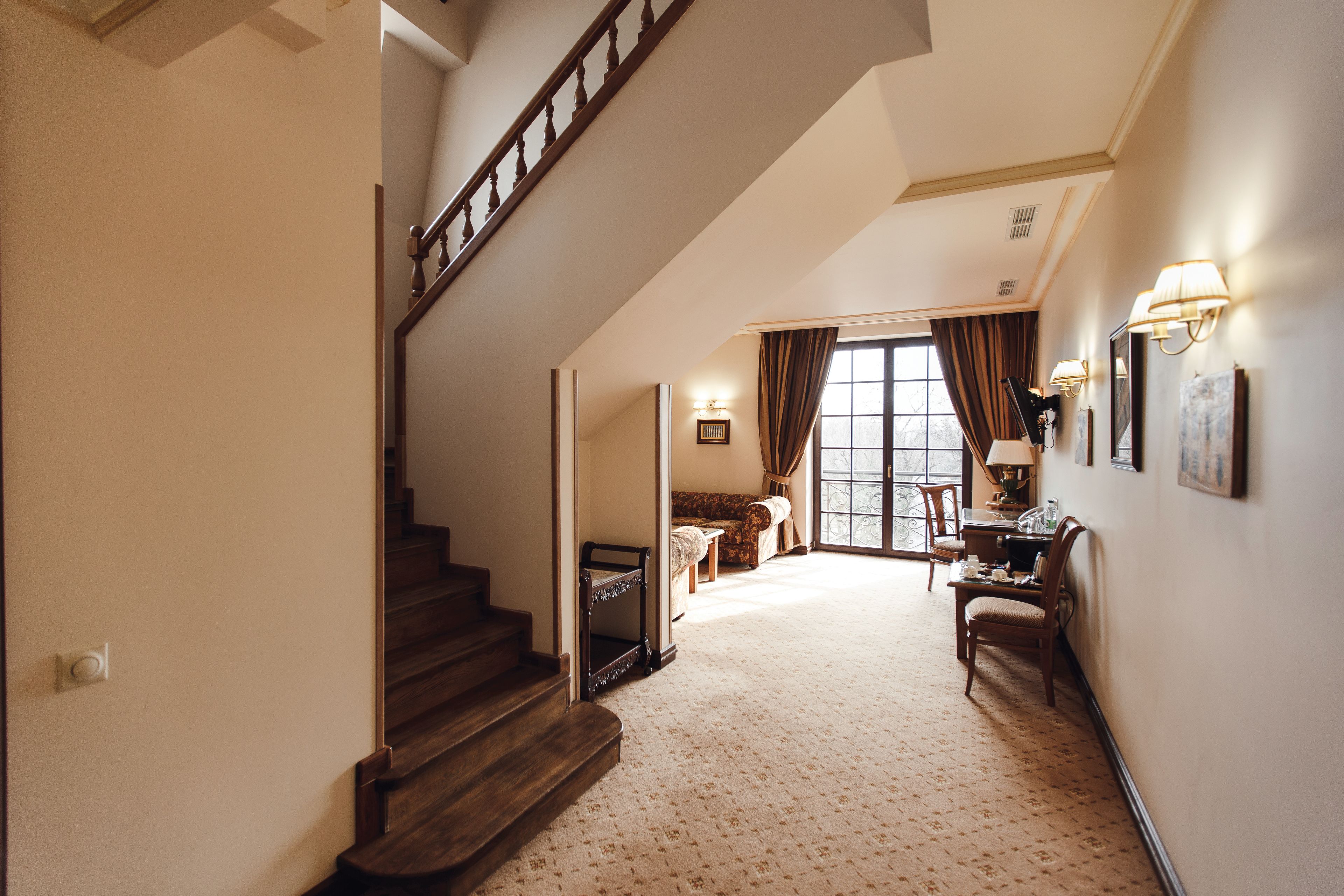 deluxe apartment | minibar, in-room safe, desk, blackout curtains