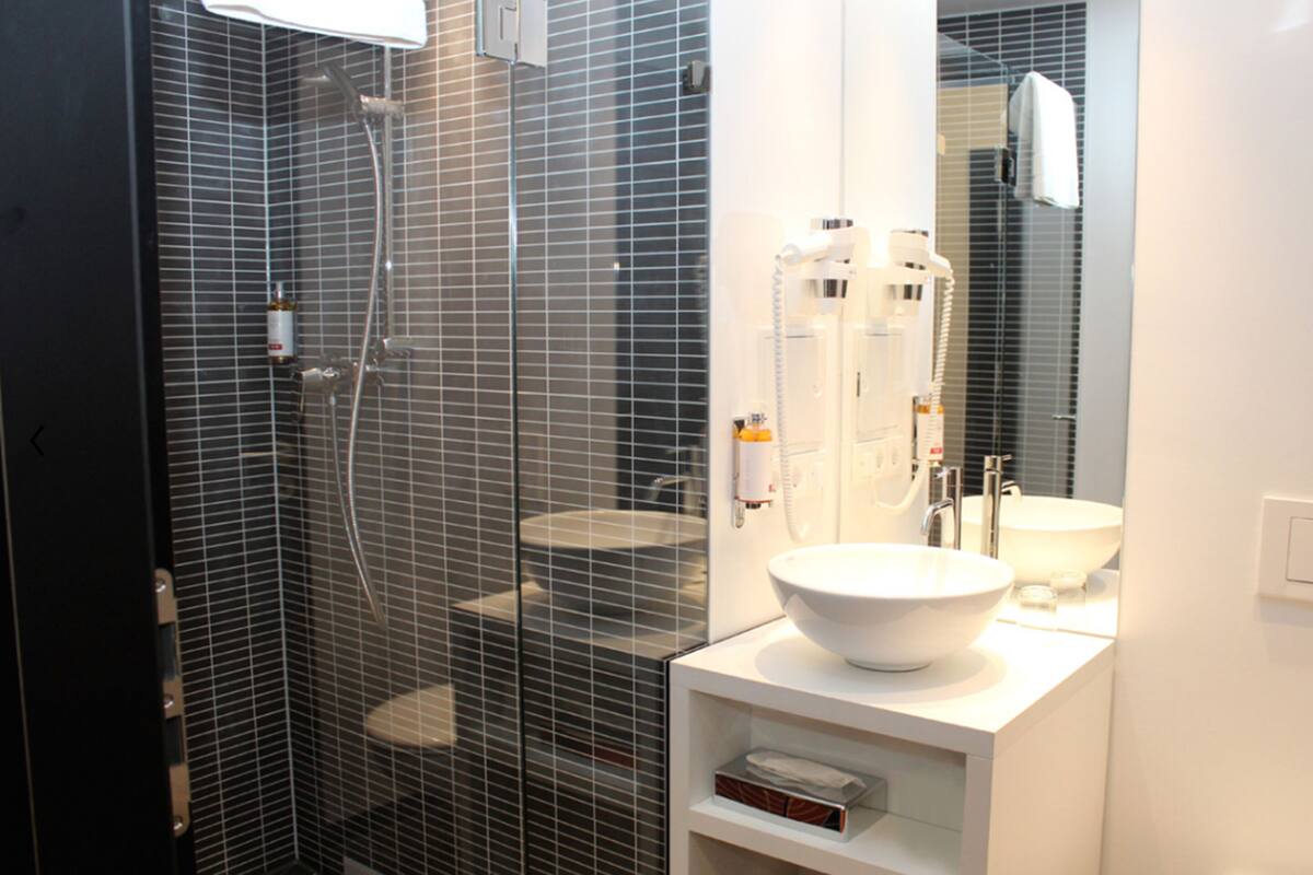 hair dryer, slippers, towels