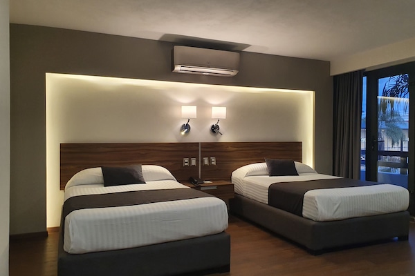 Chambre Double, 2 lits doubles | 2 chambres, coffres-forts dans les chambres, fer et planche à repasser