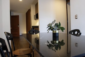 Family Suite | Living area | 50-inch flat-screen TV with cable channels, TV - Estanza Hotel & Suites (Morelia)