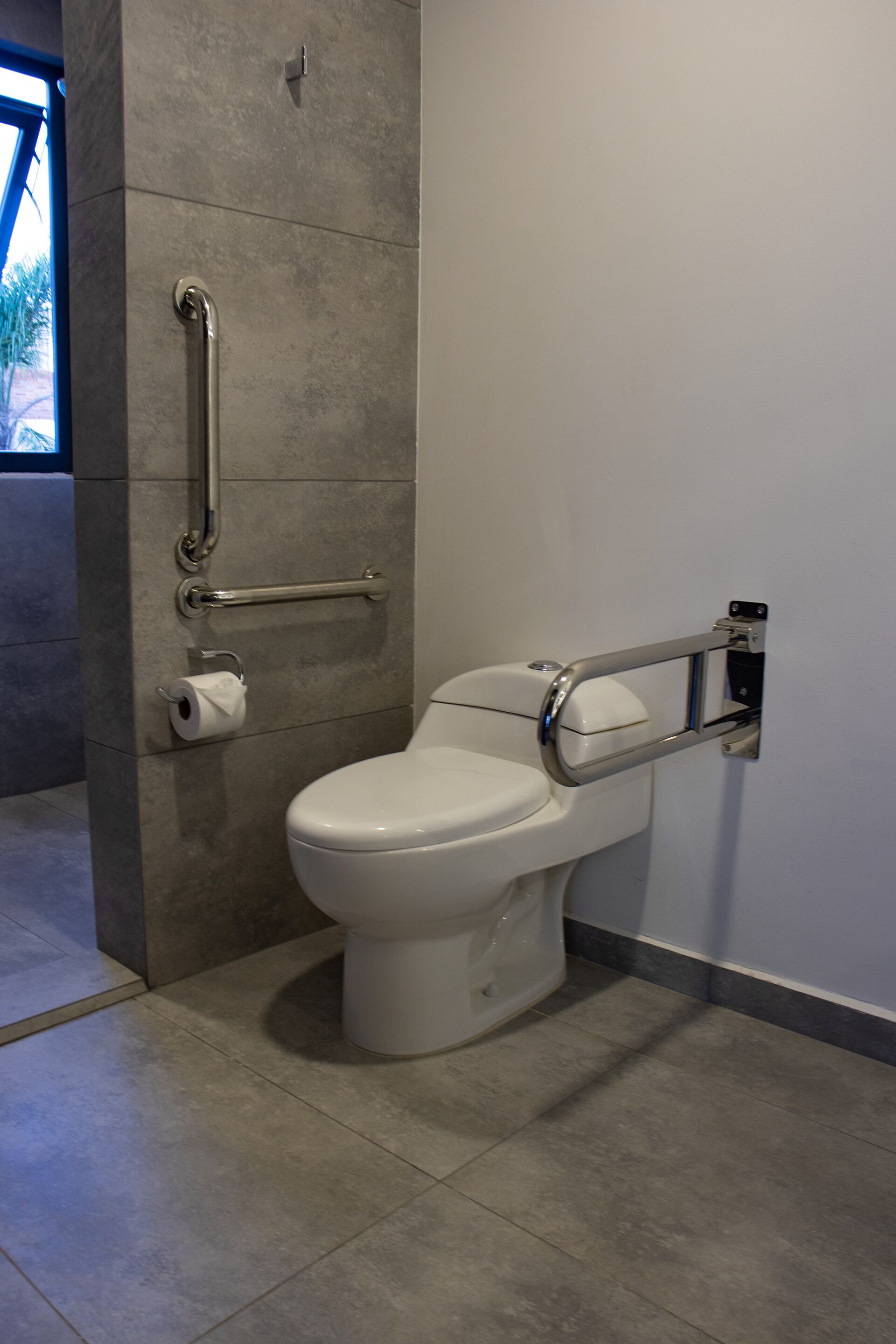 junior studio suite, city view | bathroom | shower, free toiletries, hair dryer, towels