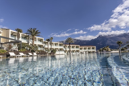 Indoor pool, seasonal outdoor pool, pool umbrellas, sun loungers