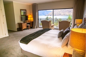 Premium bedding, down comforters, pillowtop beds, minibar