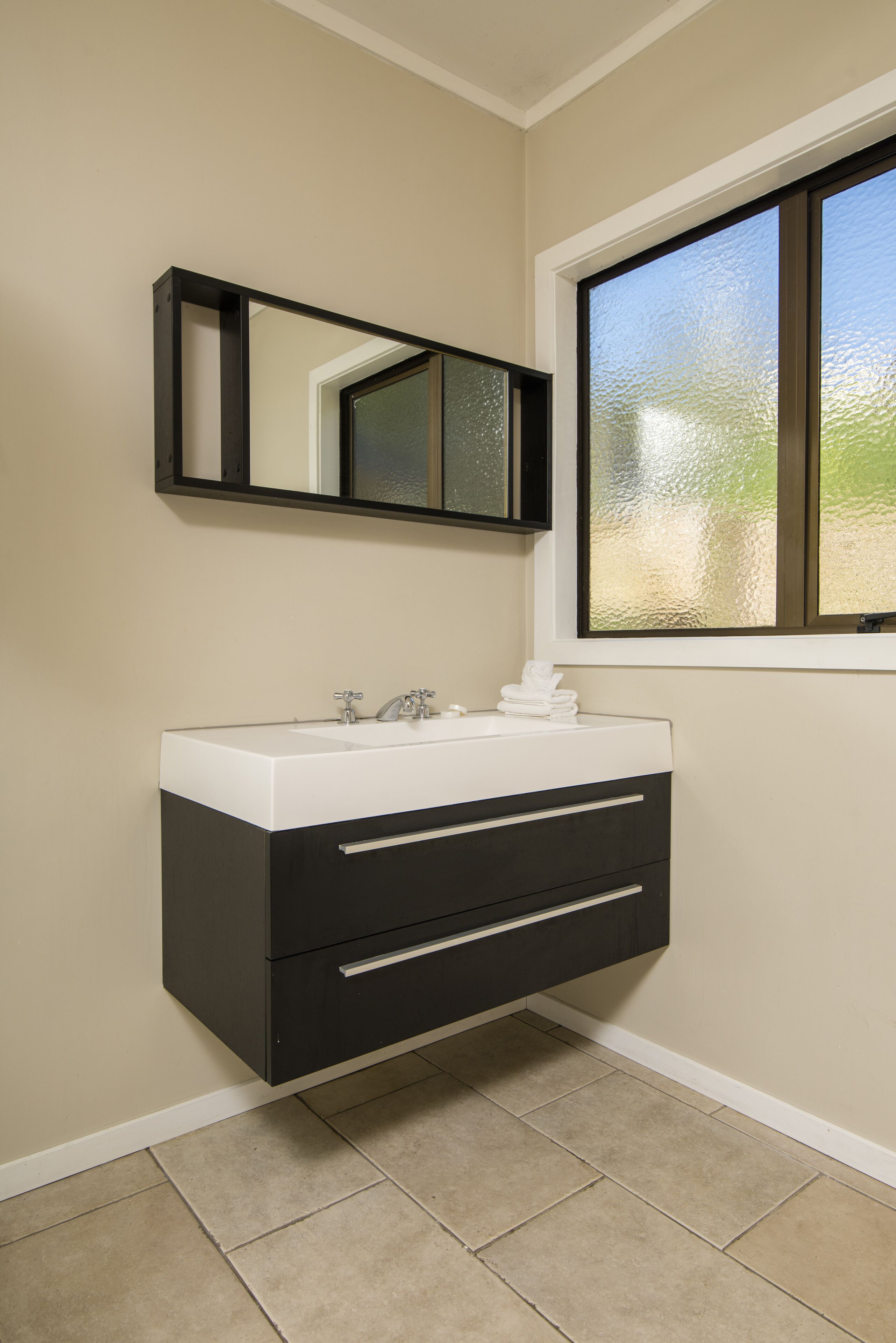 koru chalet | bathroom | shower, towels