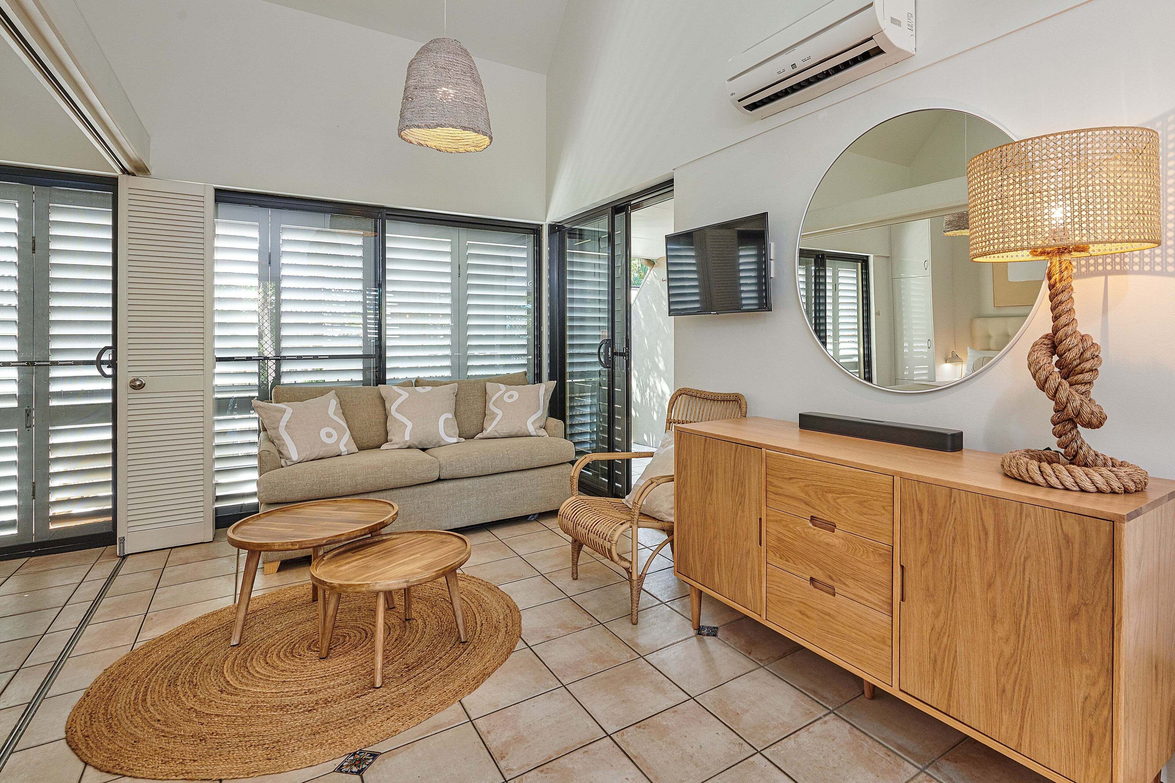 Standard Studio, 1 Queen Bed with Sofa bed (Schoolies not allowed) | Living area | LCD TV, DVD player, iPod dock