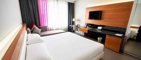 Premium bedding, down comforters, minibar, in-room safe