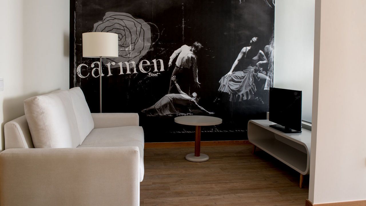 superior suite | living area | flat-screen tv