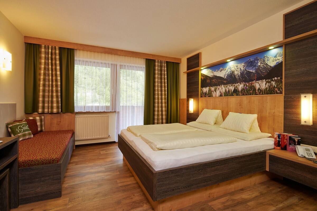 superior double room (tirol) | hypo-allergenic bedding, in-room safe, individually decorated