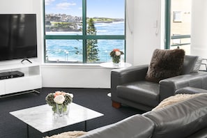 Standard 2 Bedroom Beach View Apartment | Living area | LCD TV