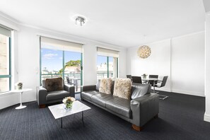 Standard 2 Bedroom Beach View Apartment | Living area | LCD TV - AEA The Coogee View Serviced Apartments (Coogee)