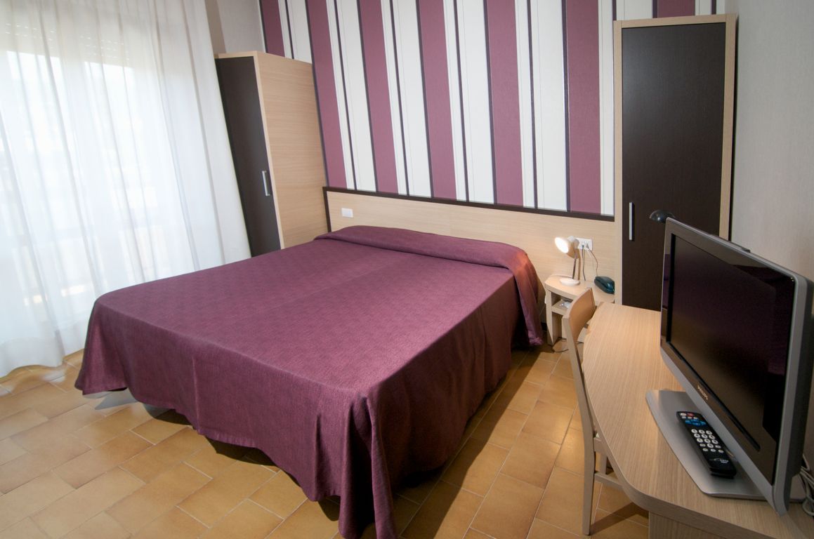 economy double room | frette italian sheets, premium bedding, down duvets, tempur-pedic beds