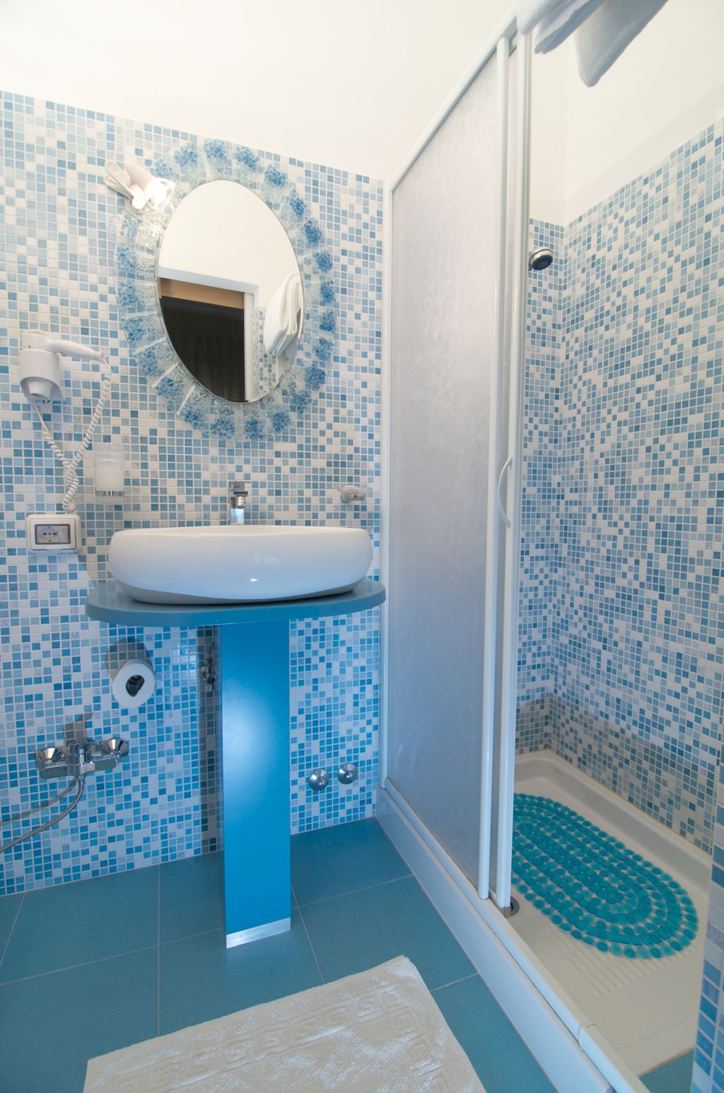 shower, rainfall showerhead, designer toiletries, hair dryer