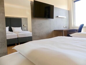 Superior Double Room | Living area | 40-cm flat-screen TV with satellite channels, TV