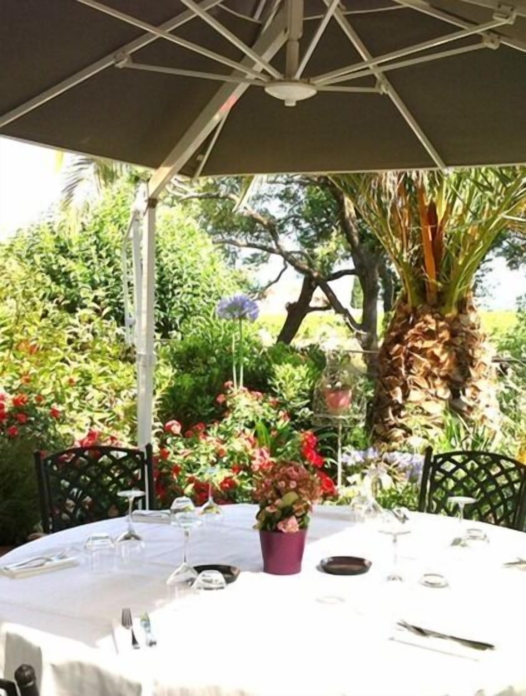 breakfast, lunch, dinner served; garden views